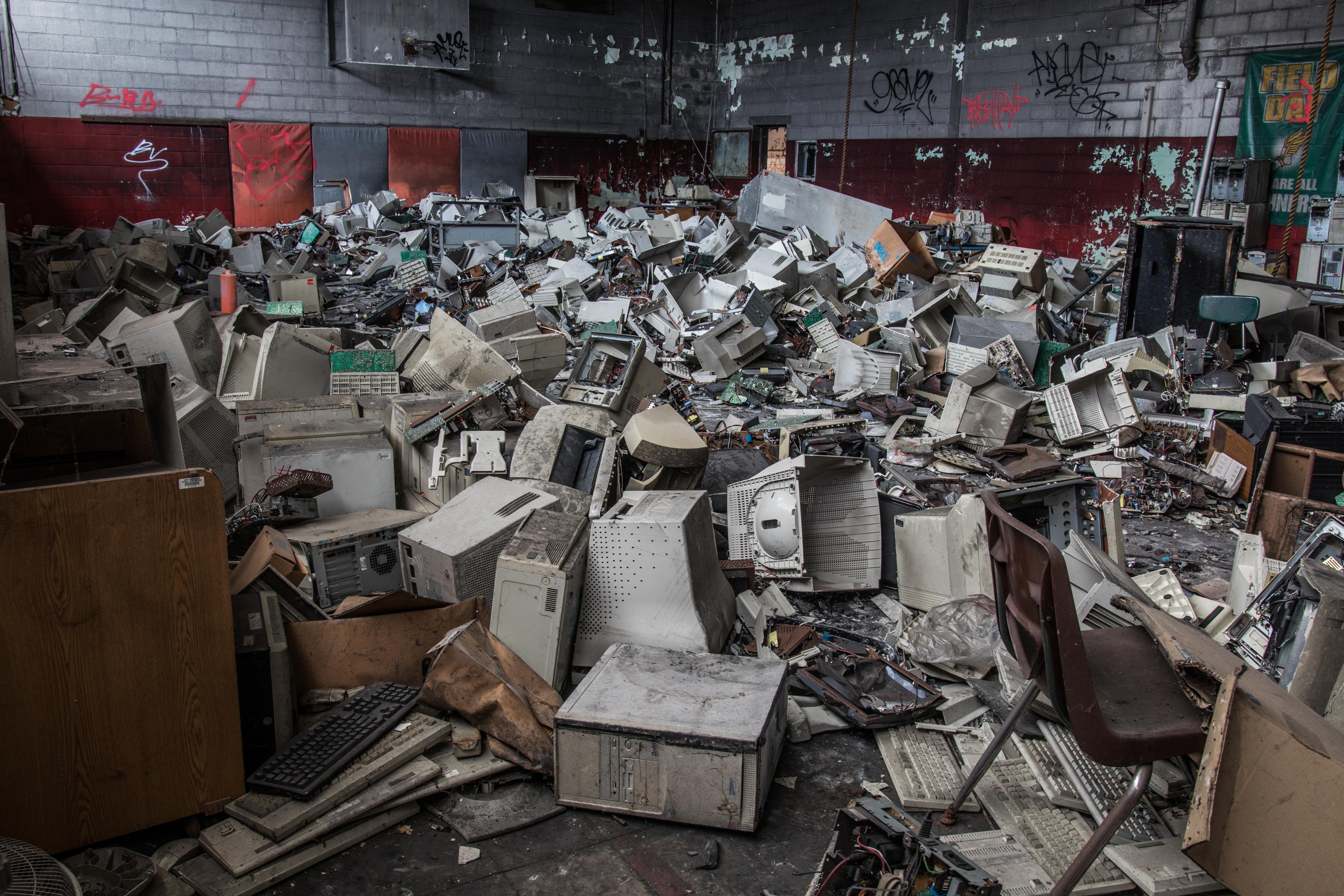 Room filled with e-waste in an abandoned building